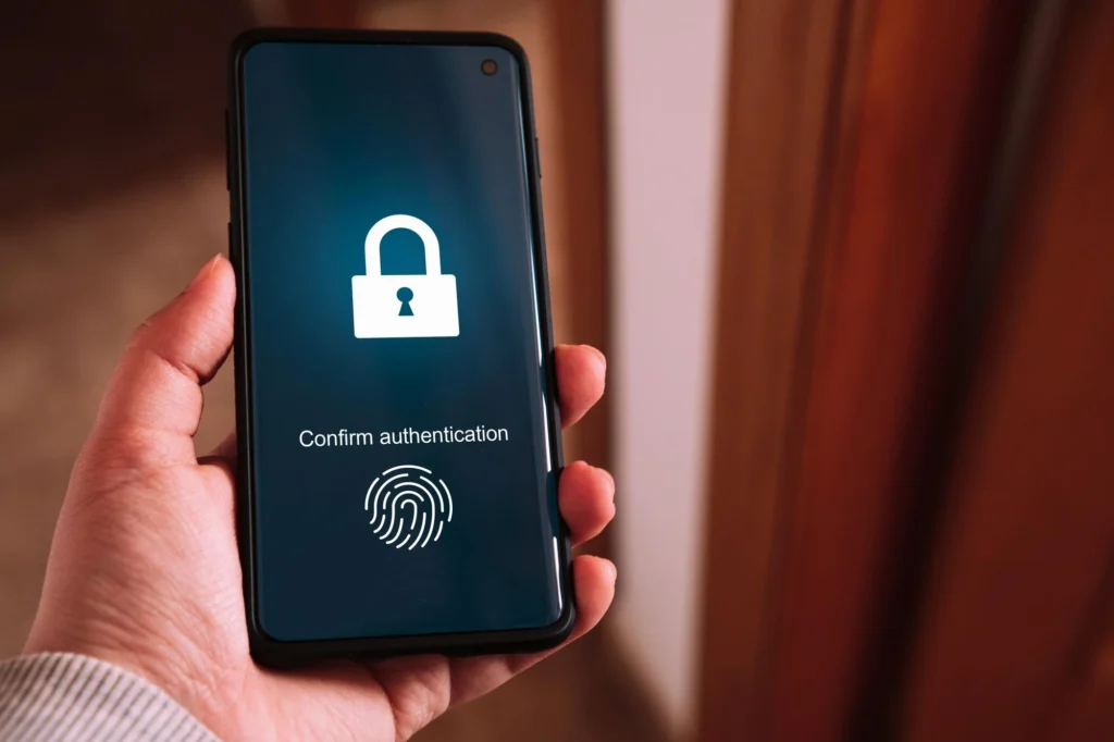 Employee managing user access settings on laptop with Shifton Access Control dashboard.
