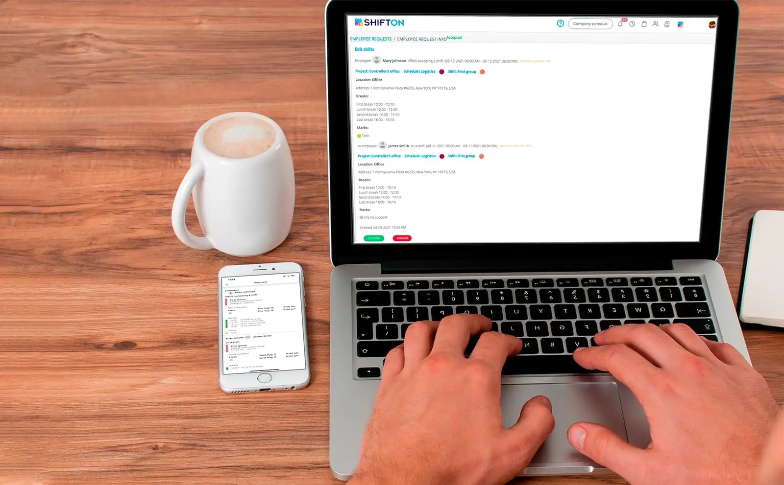 Sleek laptop, steaming coffee, and smartphone create an inviting workspace for productivity.