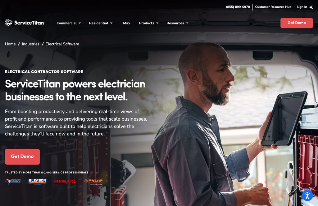 ServiceTitan electrical contractor software page with a Get Demo button over an electrician holding a tablet in a van